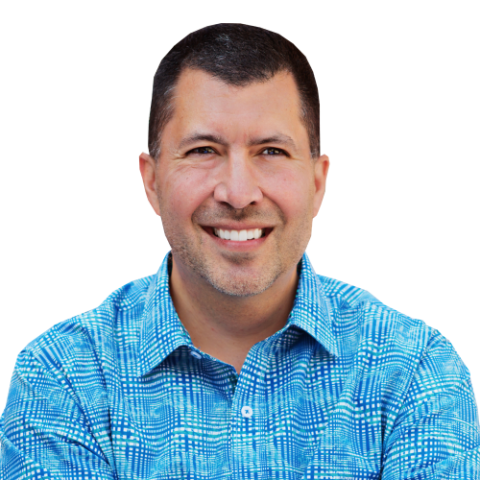 Brett Chaffer head and shoulders, wearing blue patterned dress shirt