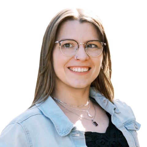 Haley head and shoulders, with glasses, brown hair, black shirt with light denim overshirt